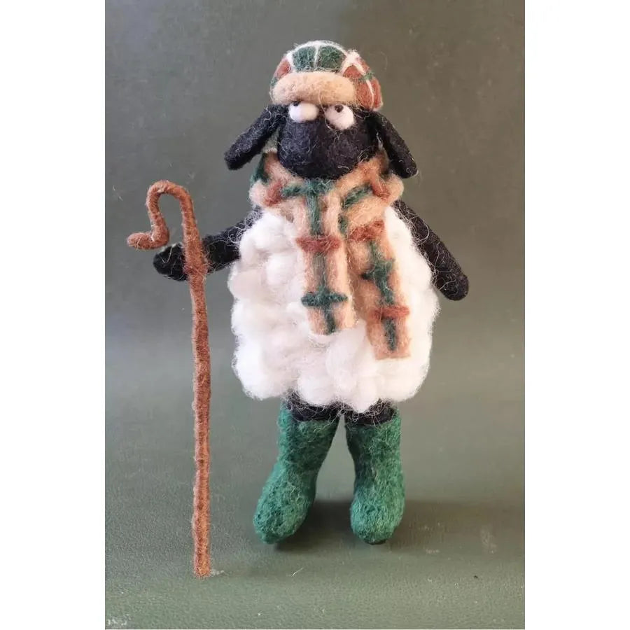 Felted Pachamama Flat Cap Stanley doll with shepherd's crook, colorful hat, scarf, and green boots, eco-friendly handmade ornament.
