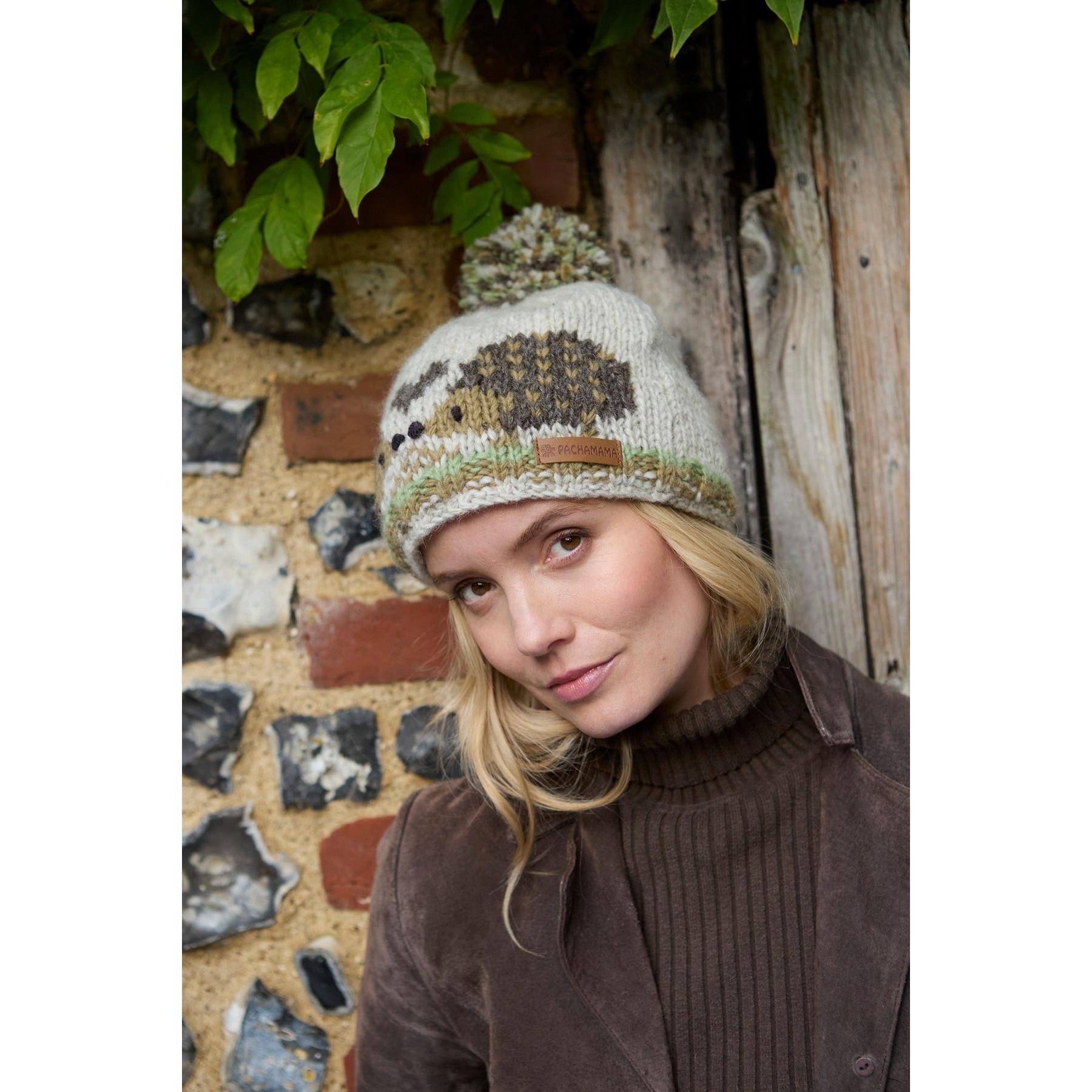 Pachamama Hedgehog bobble beanie with a cute hedgehog design, knitted, cream and brown colors, pom-pom top, for women or kids.