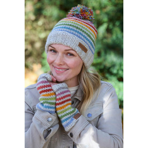 Pachamama Hoxton Stripe Merino Handwarmer set with colorful striped pattern and pom-pom beanie, warm and stylish for winter.