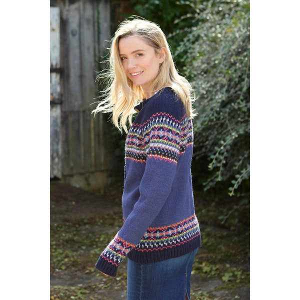 Pachamama Iona Cardigan Denim, women's knit sweater with colorful Fair Isle pattern, long sleeves, and navy blue base.