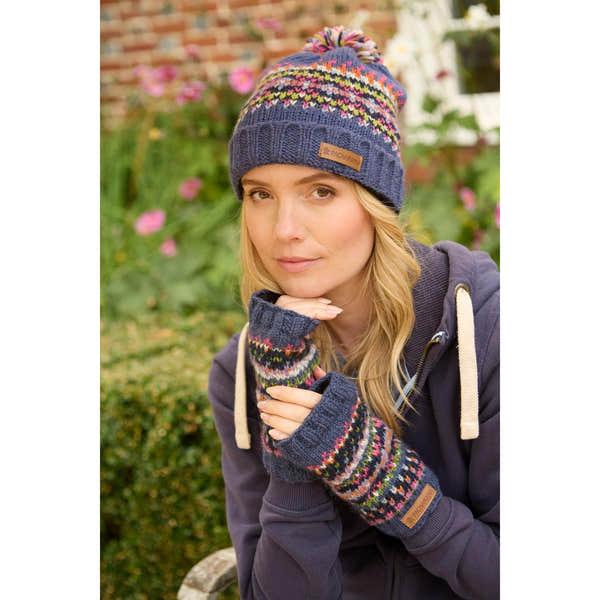Pachamama Iona Handwarmer Denim, knitted fingerless gloves and beanie set with colorful patterns and a leather logo patch.