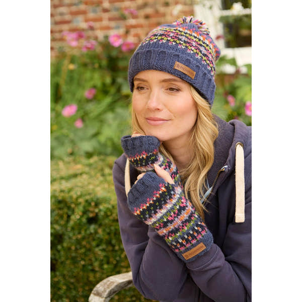 Pachamama Iona denim handwarmer and beanie set featuring colorful knit patterns, soft fleece lining, and leather logo tags.