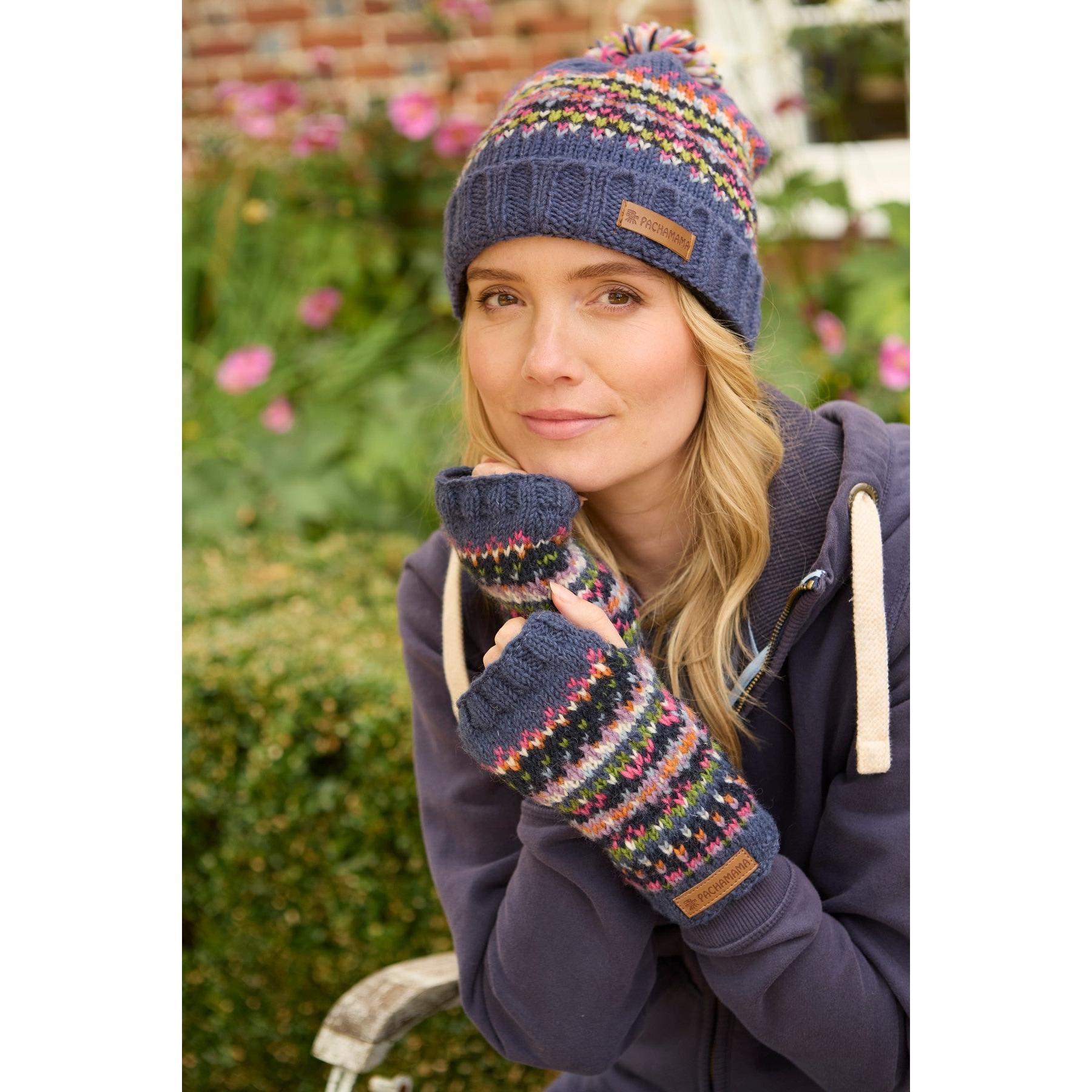 Pachamama Iona Roll Back Bobble Beanie Denim with colorful knit pattern and matching mittens, cozy winter accessory for women.
