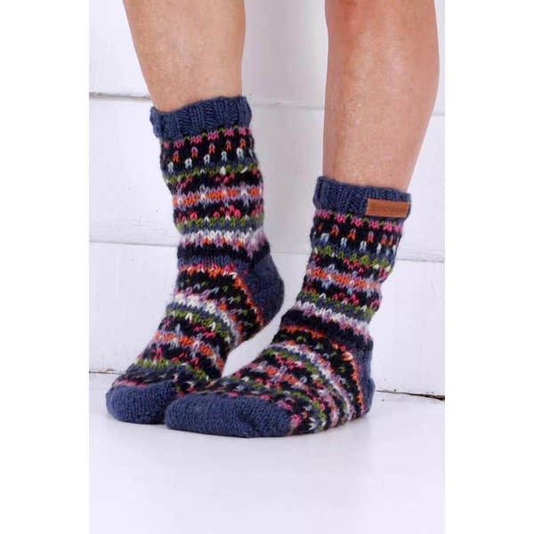 Pachamama Iona denim sock socks with colorful knit pattern, high ankle design, and leather logo tag.