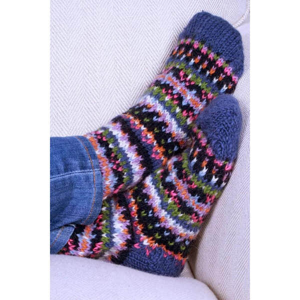 Pachamama Iona denim socks with colorful knit pattern, faux denim upper, cozy design, perfect for warmth and style.