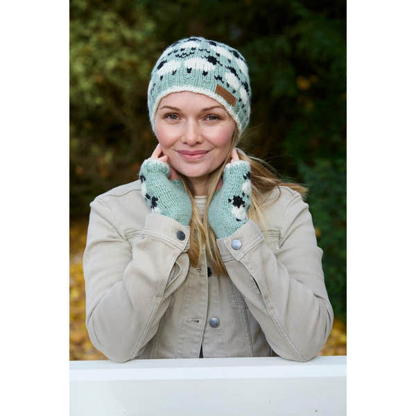 Pachamama Merino Sheep Handwarmer and Green Beanie, knit wool accessories for women, outdoor winter fashion, cozy and stylish.