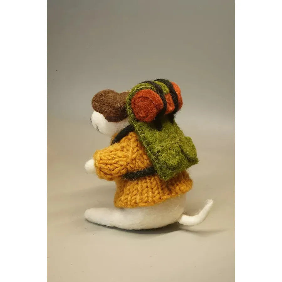 Felted mouse doll wearing a yellow dress and green backpack with red headphones, 