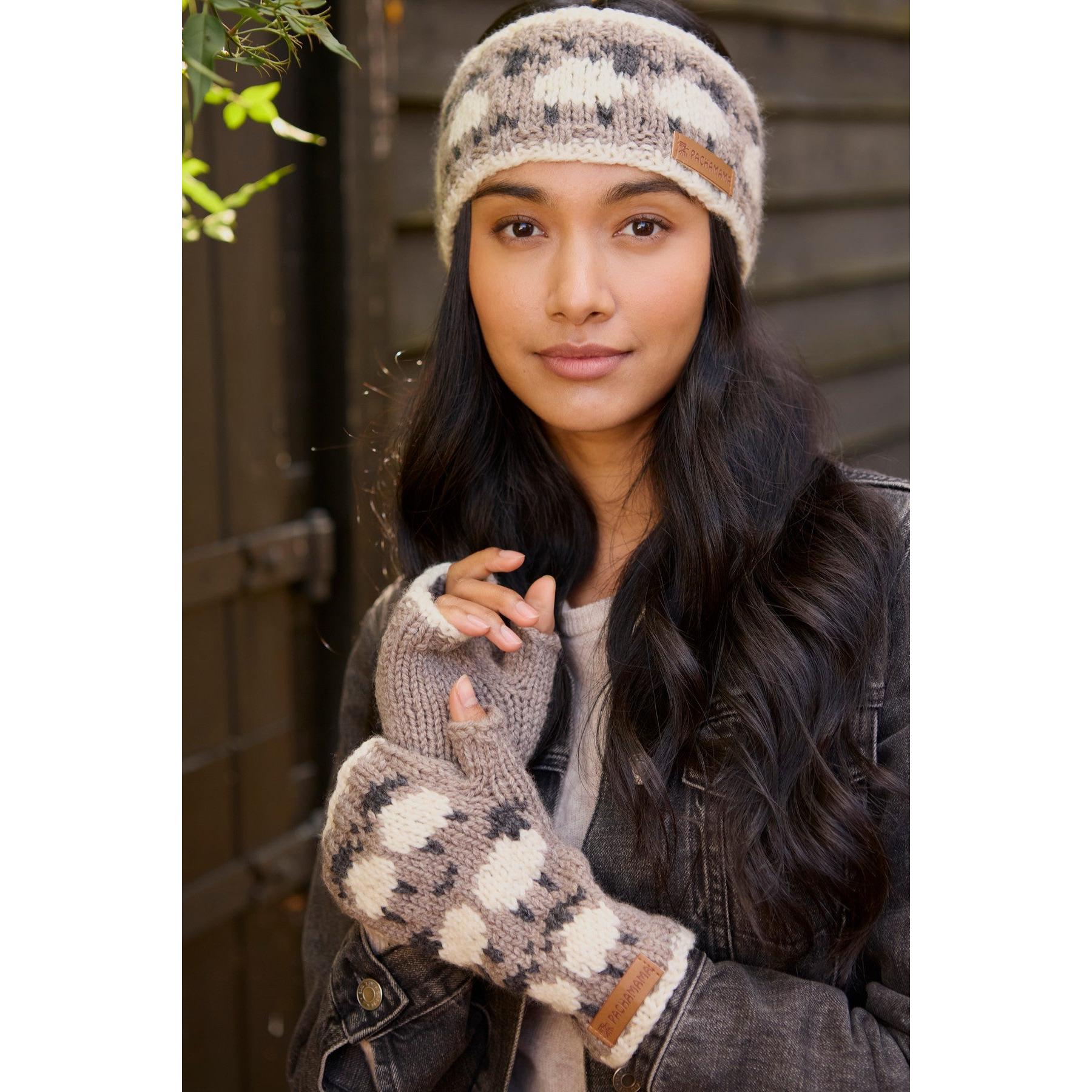 Pachamama Merino Sheep headband with mushroom design, knitted, beige and brown colors, and a leather logo tag.