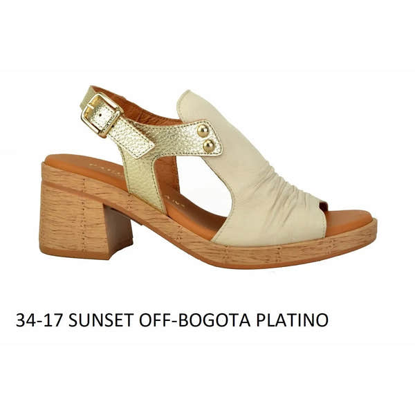 Paula Urban women's off-shoulder leather buckle sandal with sunset hue, wooden block heel, and metallic gold accents.