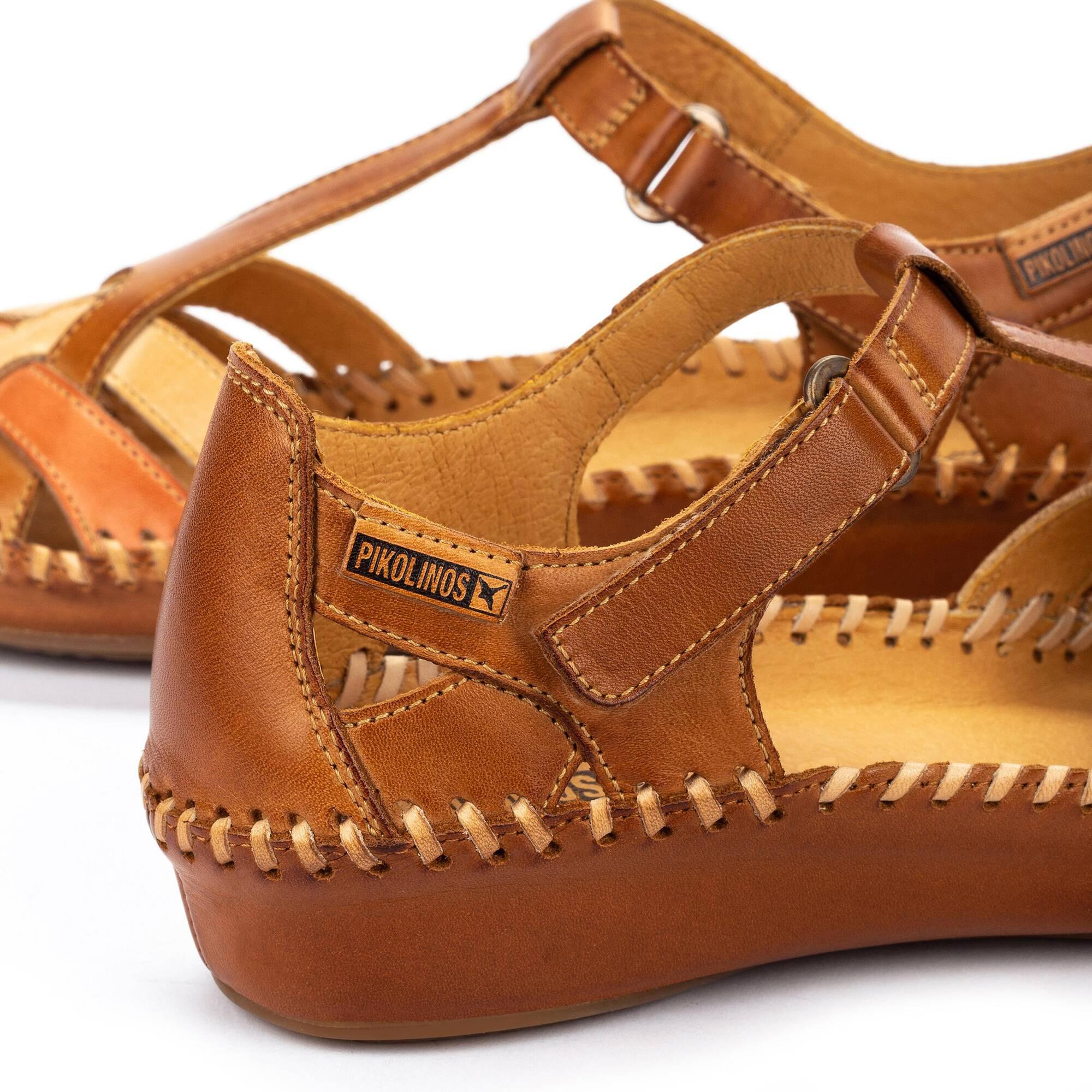 Pikolinos Vallarta Brandy Leather T-Bar Sandals with stitched details and adjustable strap, outdoor casual footwear.