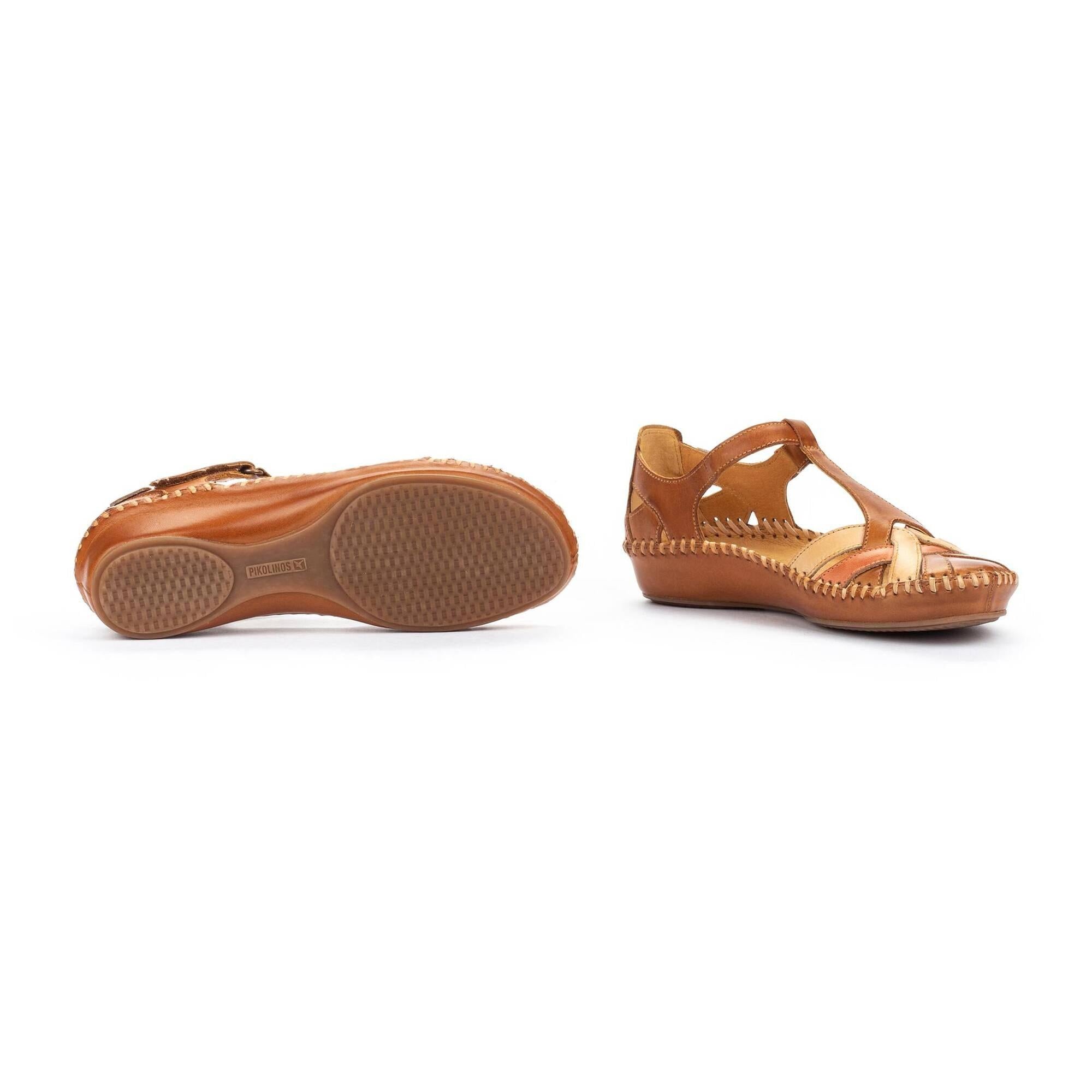 Pikolinos Vallarta Brandy Leather T-Bar Sandals with woven detailing and slip-on design, in tan and beige leather.