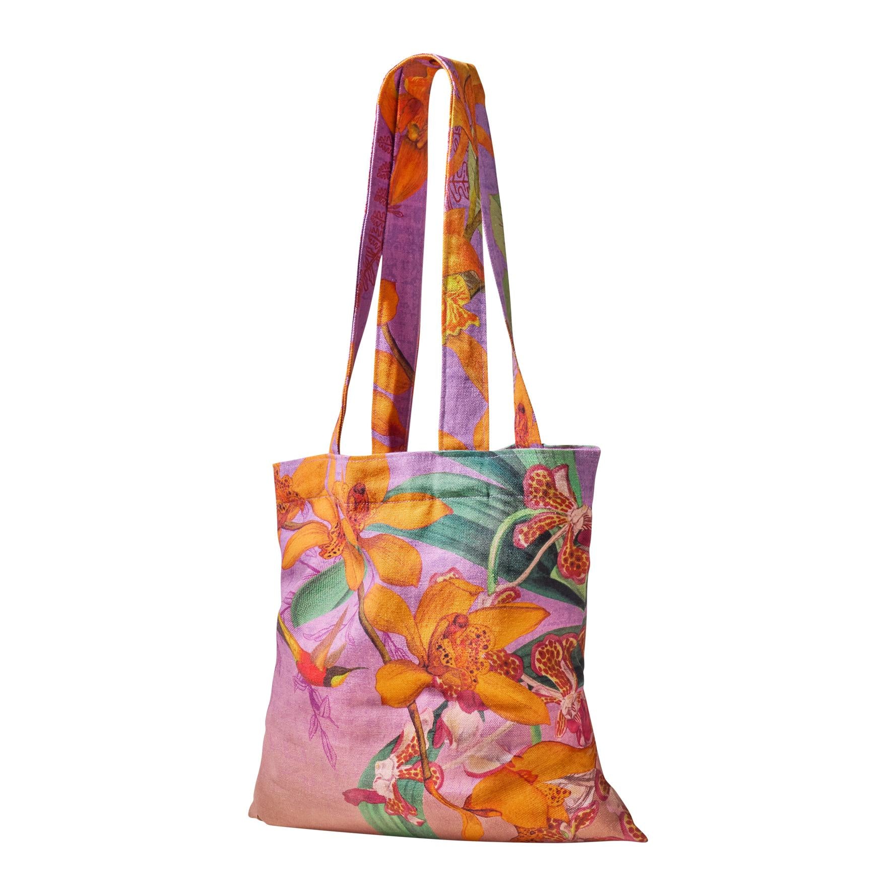 Powder Botany Bliss lavender canvas tote bag with vibrant floral print and long straps.