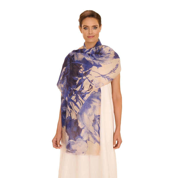 Powder China Blue blooms linen and cotton mix scarf worn by woman, featuring floral print and lightweight fabric.