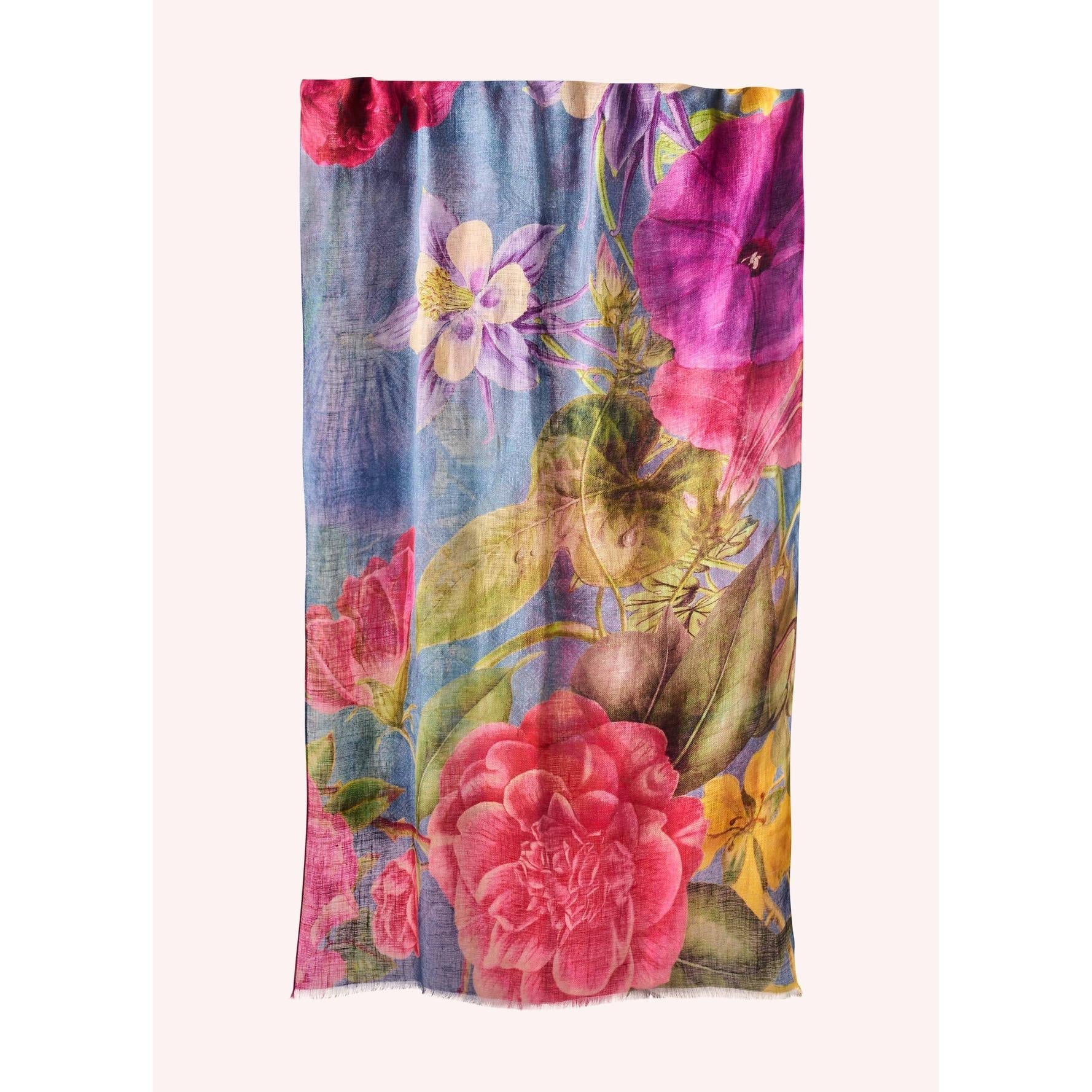 Powder floral study linen and cotton blend scarf in denim with vibrant pink, purple, and yellow flower print.