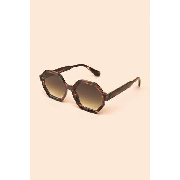 Powder Raven Ltd Edition tortoiseshell sunglasses with gradient lenses and hexagonal frames.