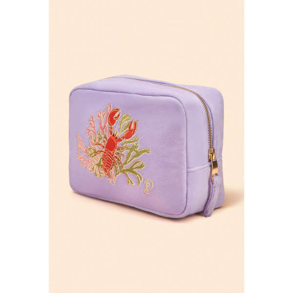 Powder Velvet makeup bag with embroidered lobster design, lavender color, gold zipper, and compact rectangular shape.