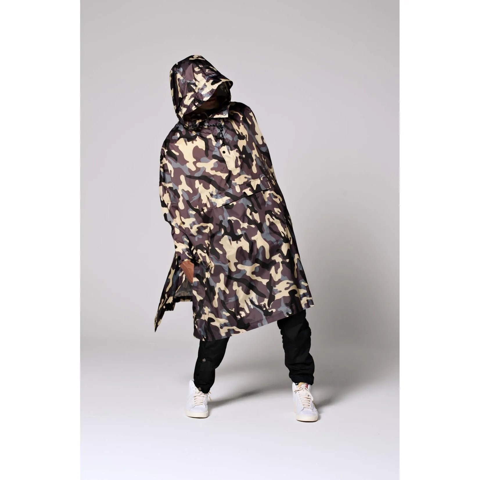 Rainkiss Camo rain poncho with hood, camouflage pattern, water-resistant fabric, and knee-length design.