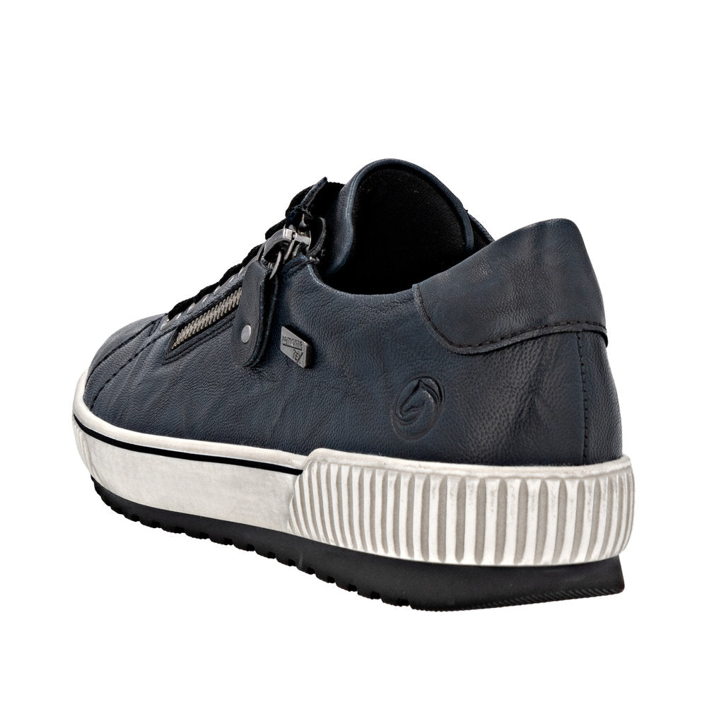 Remonte D0700-15 women's navy leather water-resistant zip and lace sneakers with sporty white and black sole.