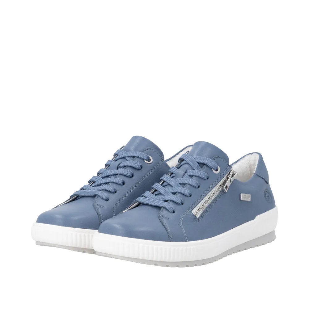 Blue leather lace-up shoes with side zipper, white sole, and water-resistant design, perfect for casual wear.