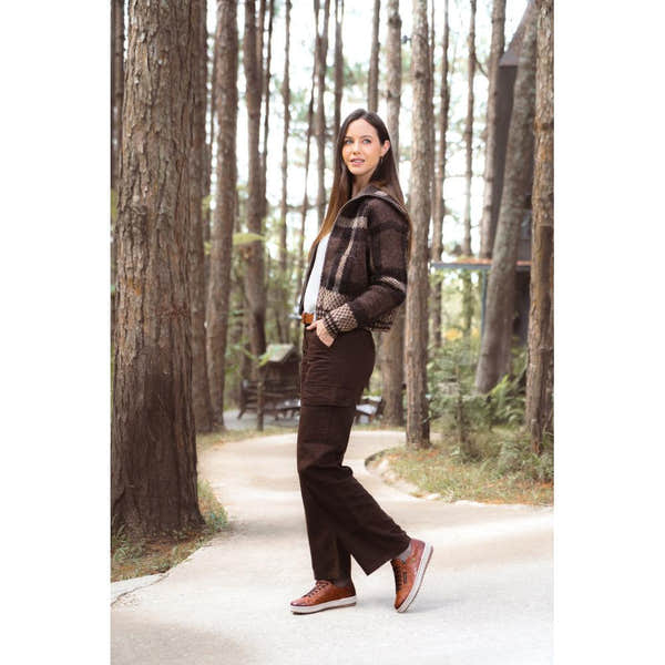 Ladies' wide fit brown leather water-resistant shoes with zip and lace closure, worn outdoors in a forest setting.