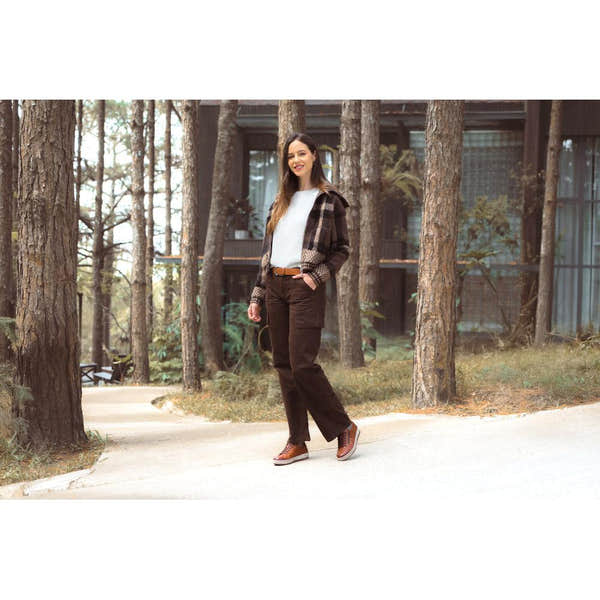 Remonte D0700-22 women's wide brown leather water-resistant zip and lace shoes, outdoors in a wooded area.