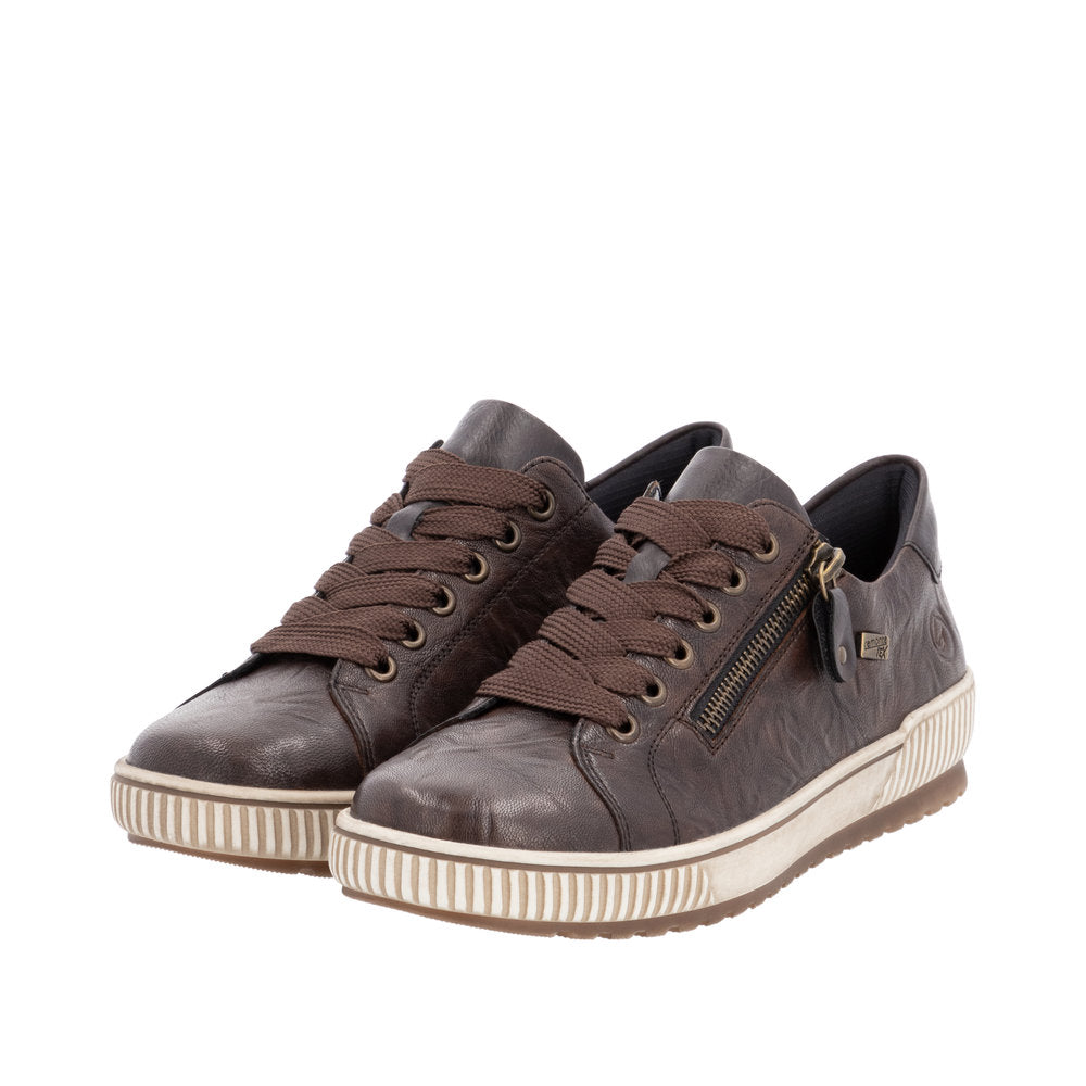 Remonte D0700-25 women's wide fit brown leather water-resistant sneakers with zip and laces, V-shaped design, and textured sole.