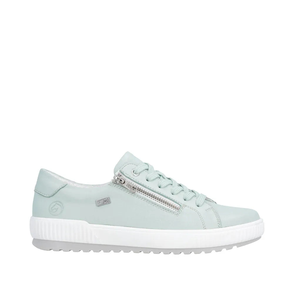 Remonte women's mint leather sneakers with water-resistant finish, featuring laces, a side zipper, and a white rubber sole.