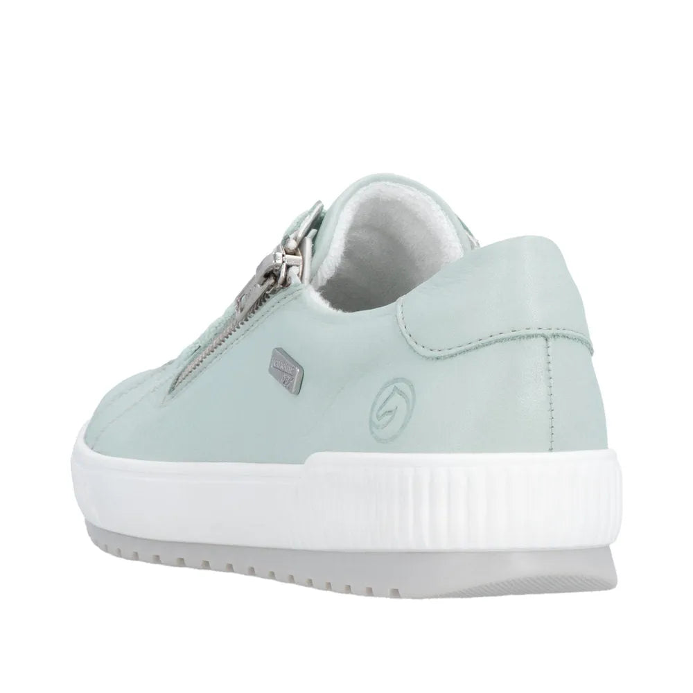 Ladies mint leather water-resistant shoes with zipper and lace, white sole, and soft interior lining.