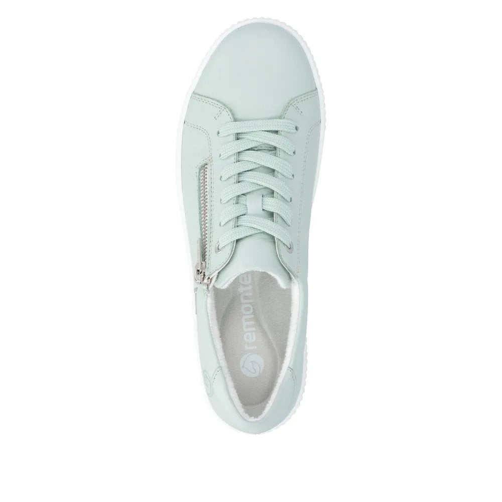 Ladies mint leather water-resistant sneakers with zip and lace closure, cushioned interior, and textured sole.