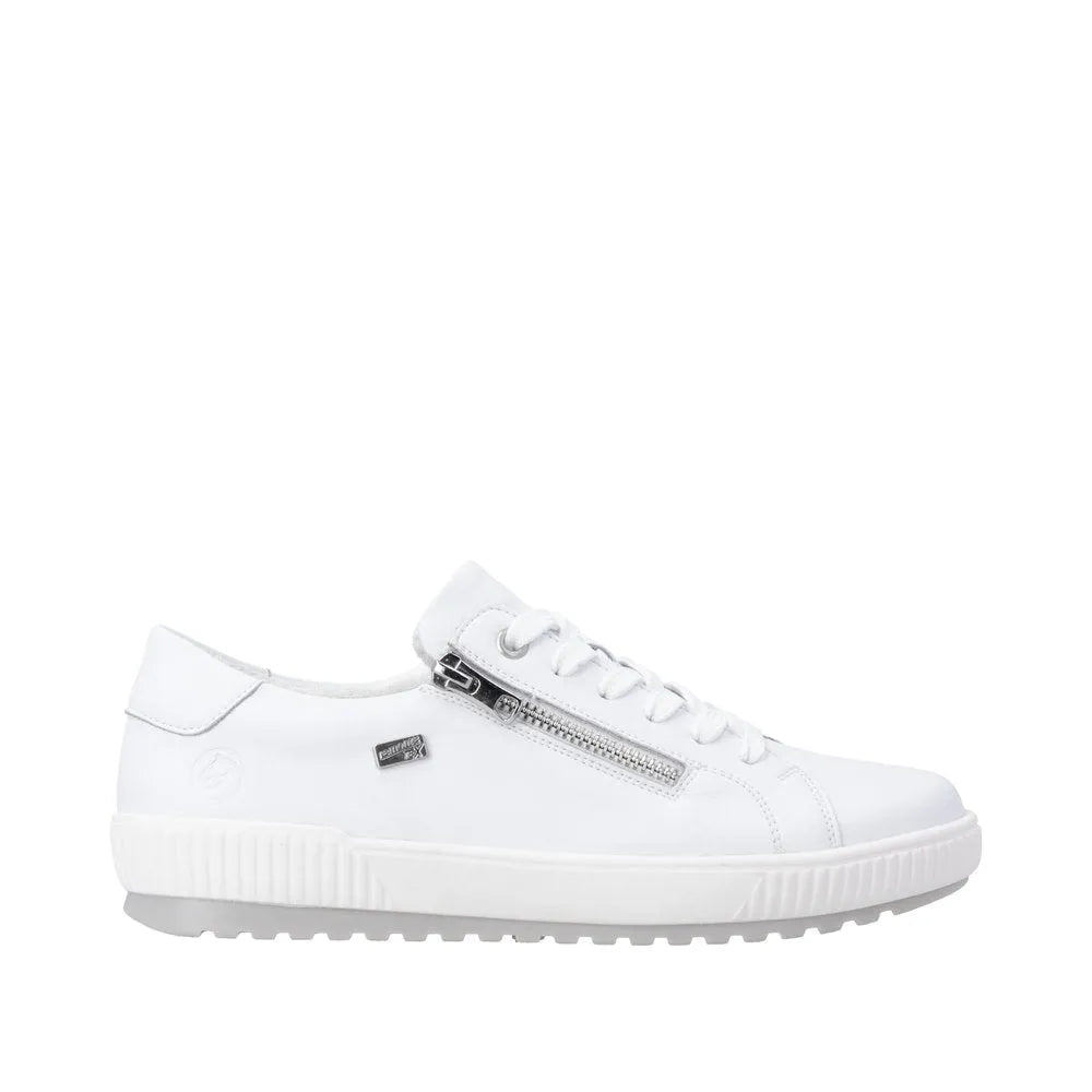 White leather water-resistant ladies' shoes with zip and lace closure, featuring a chunky sole and subtle detailing.