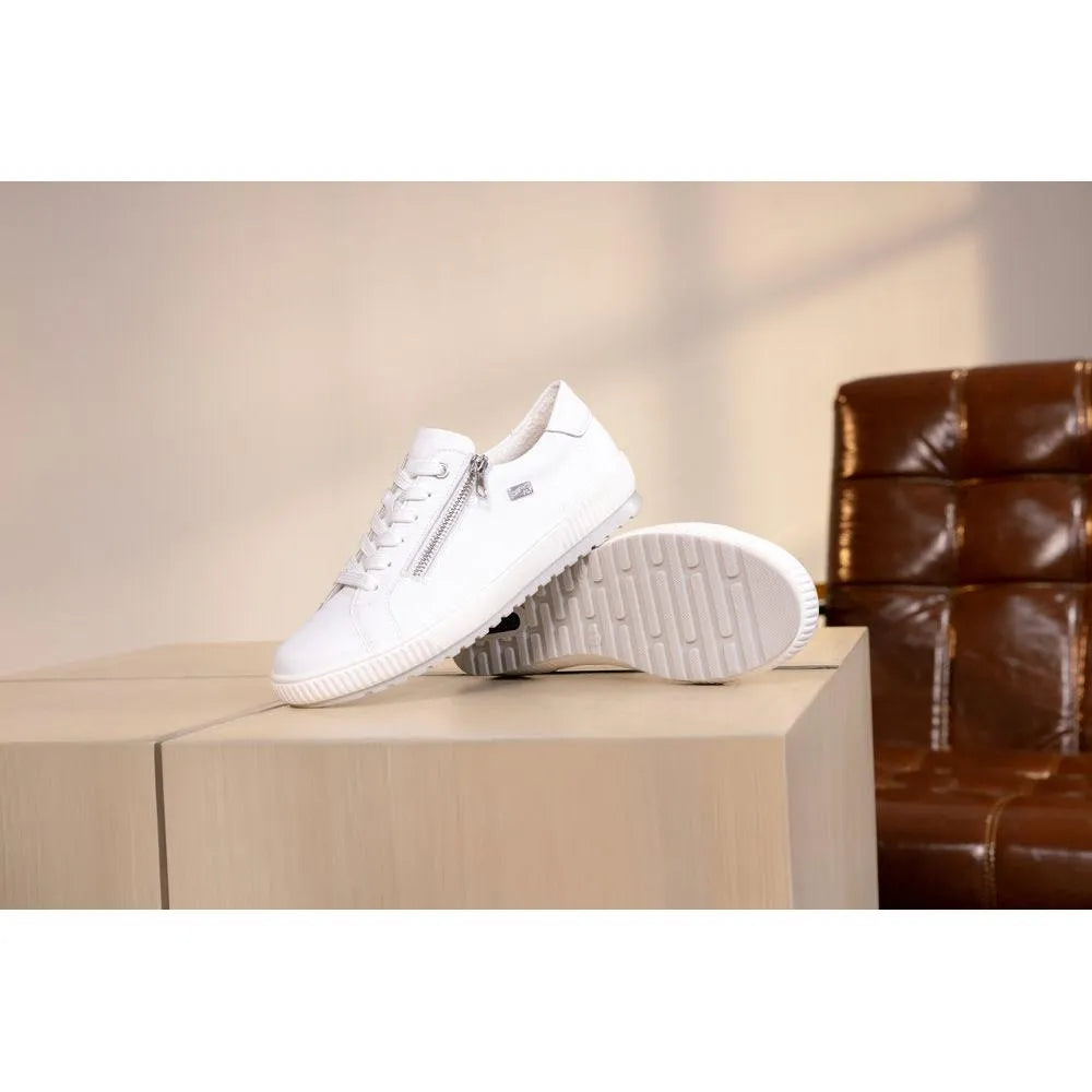 White leather water-resistant shoes with zip and lace design, featuring textured sole and lightweight style.