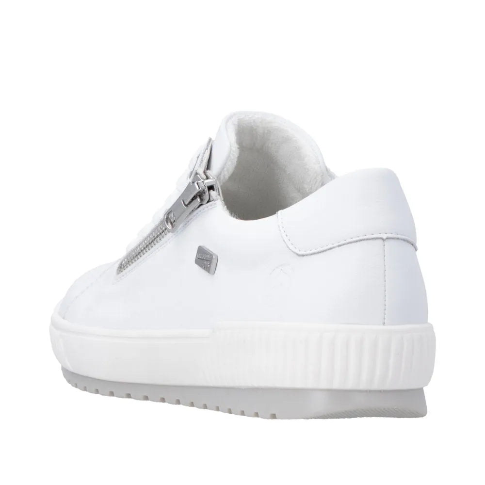 White leather ladies' shoes with zip and lace closure, water-resistant, featuring a textured rubber sole.