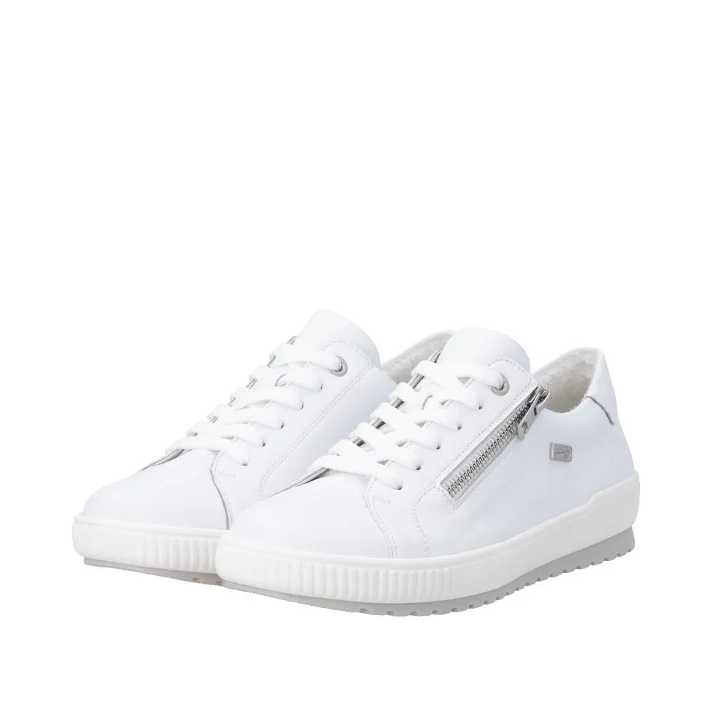 White leather zip and lace shoes with water-resistant design, featuring a chunky sole and stylish silver accents.