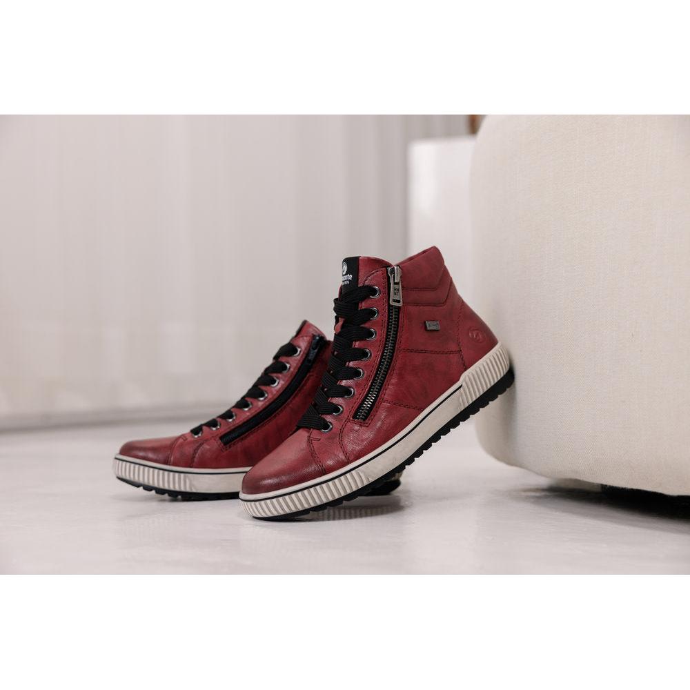 Remonte D0772-36 women's red leather ankle boots with water resistance, side zips, laces, and rugged white soles.
