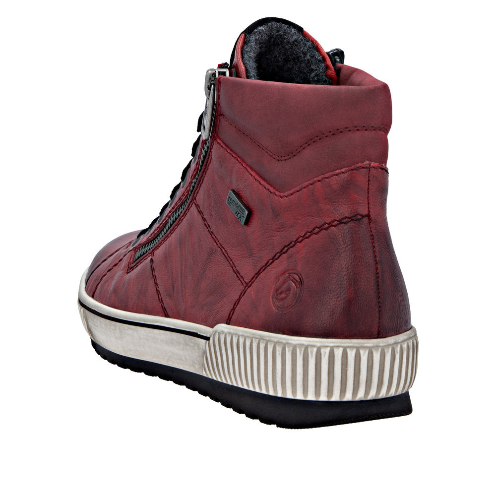 Remonte D0772-36 women's red leather water-resistant ankle boots with zip and lace, cushioned interior, and chunky sole.