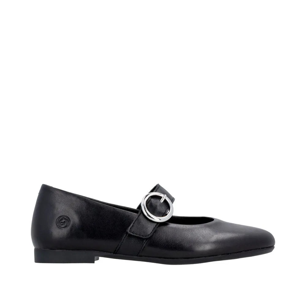 Black leather ladies' shoes with a touch fastening strap and silver buckle, flat sole, and rounded toe.