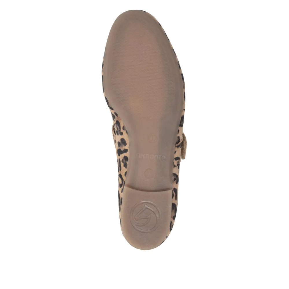 Leopard print suede girl's touch fastening shoes with a flat sole and round toe, view of the bottom tread.