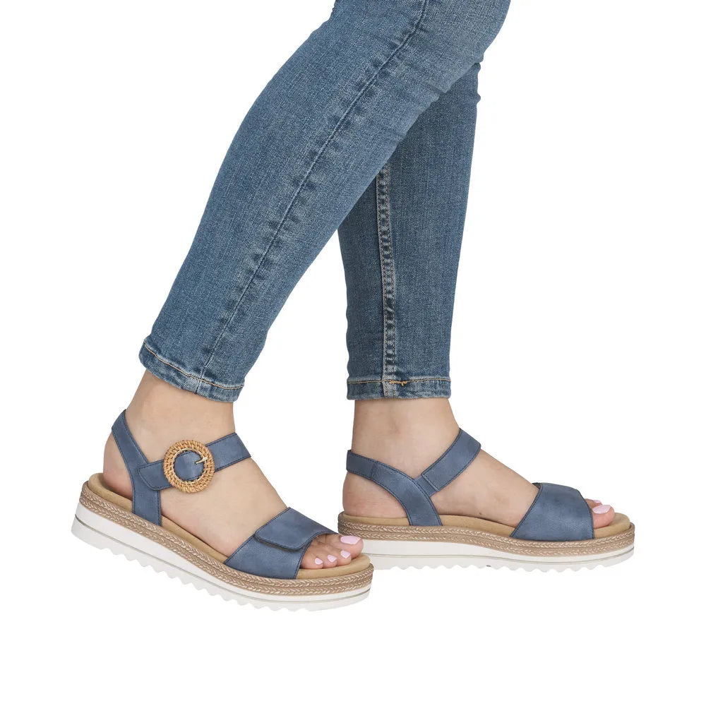 Remonte D0Q52-14 women's navy denim leather touch fastening sandals with chunky white sole and decorative buckle.