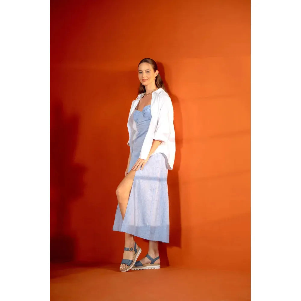 Remonte D0Q52-14 ladies navy denim leather touch-fastening sandals on a woman in a white shirt and blue dress against orange background.