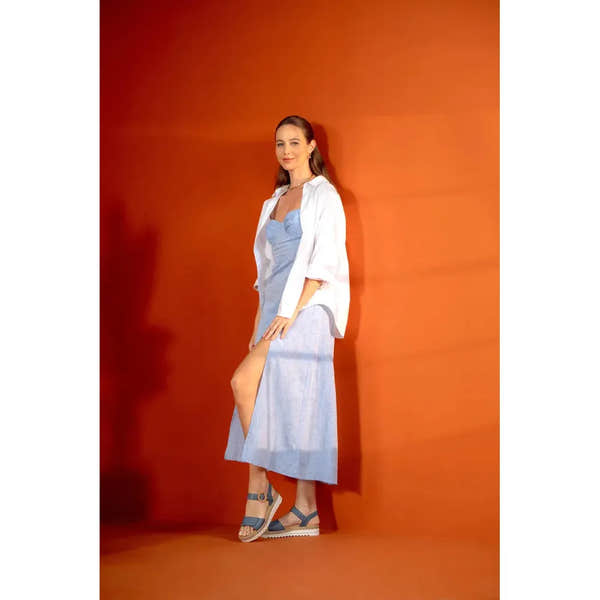 Remonte D0Q52-14 ladies navy denim leather touch-fastening sandals on a woman in a white shirt and blue dress against orange background.