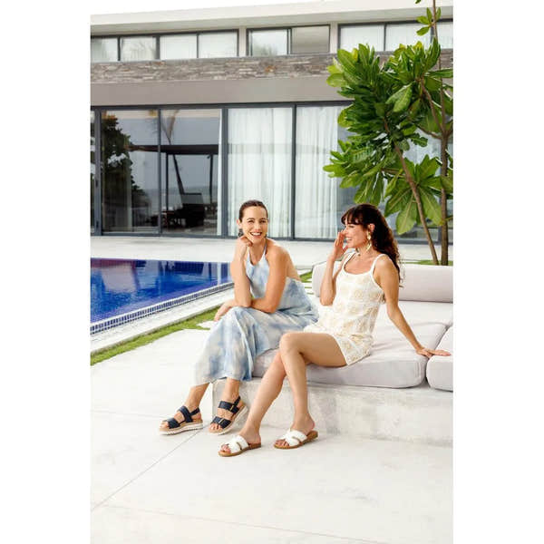 Remonte D0Q59-14 Ladies Pacific Navy Leather Touch Fastening Sandals, stylish open-toe summer footwear on two women by poolside.