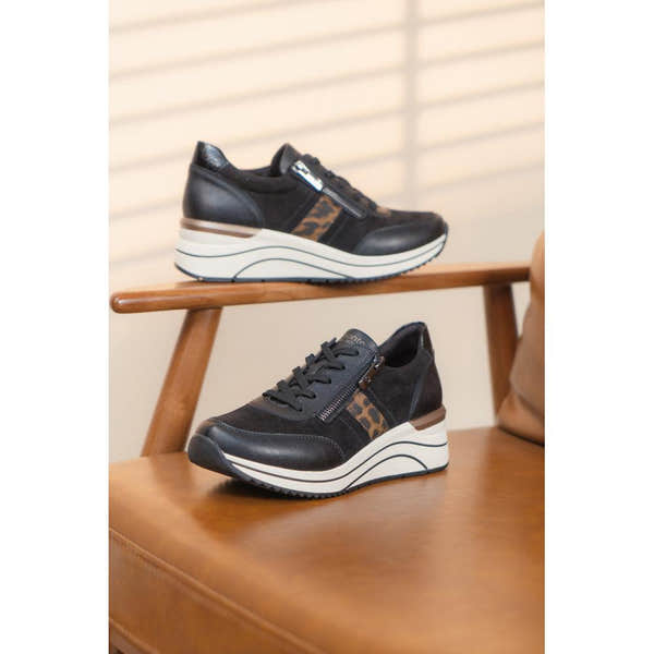 Remonte D0T09-04 women's wide-fit black vegan sneakers with zip and lace-up design, leopard print accents, and thick wedge sole.