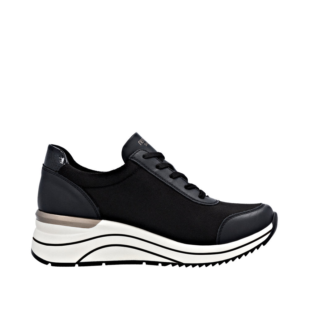 Black vegan women's wide-fit zip and lace-up sneakers with a chunky white and black sole.