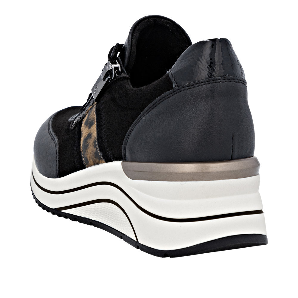 Remonte D0T09-04 women's wide black vegan slip-on shoes with lace and zip, leopard print detail, chunky white and black platform sole.