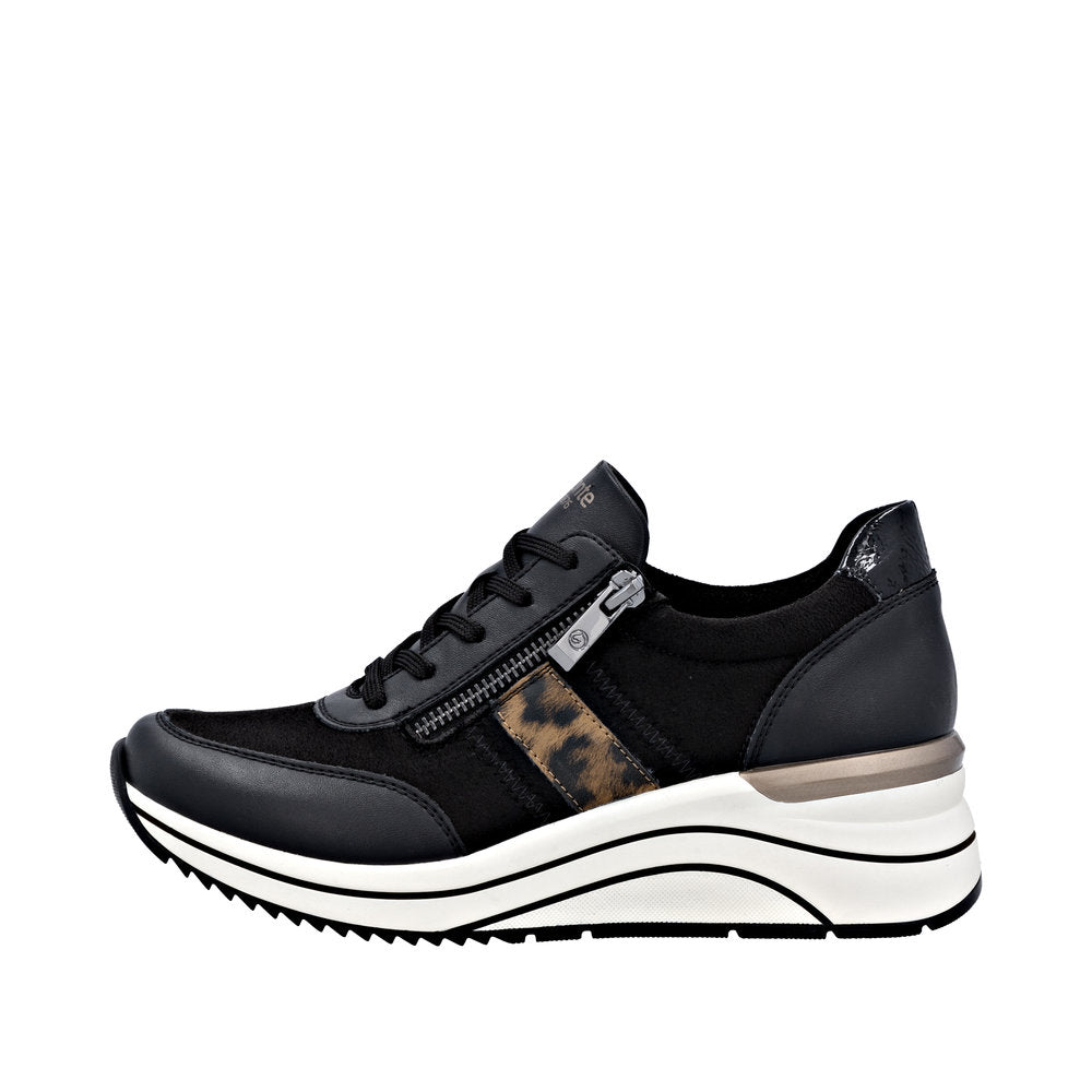 Remonte D0T09-04 women's wide-fit black vegan zip and lace-up sneakers with a chunky white sole and animal print detail.