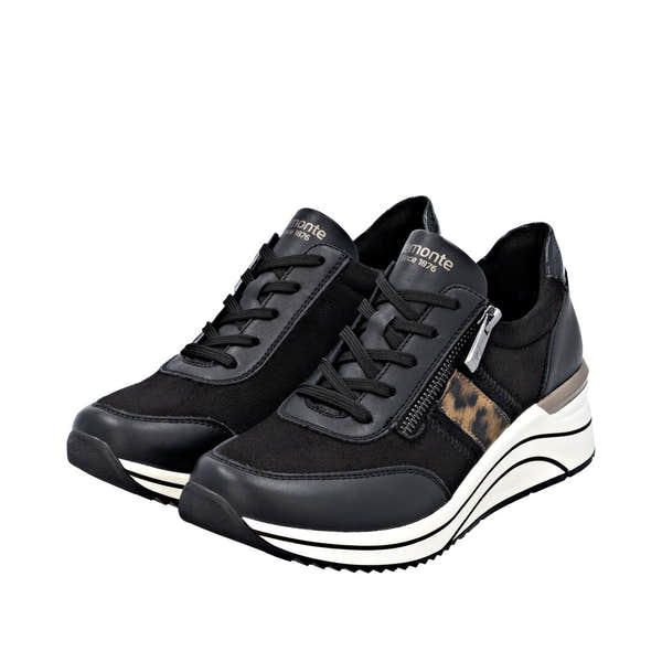 Remonte D0T09-04 women's wide black vegan sneakers with lace-up, zip detail, animal print accent, and chunky white and black sole.