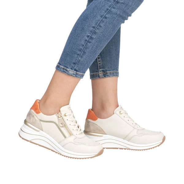 Remonte D0T10-80 women's wide-fit trainers with multi-zip and lace design, featuring beige, white, and orange accents.
