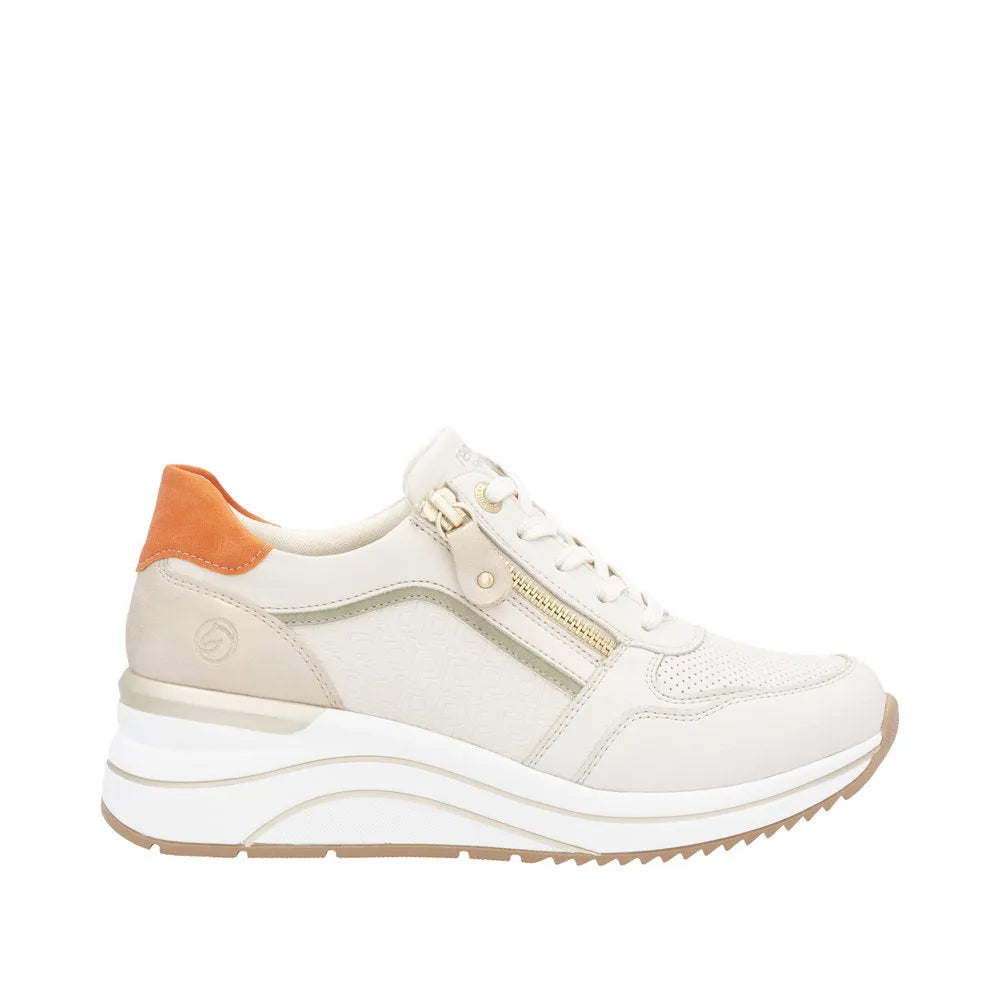Remonte D0T10-80 women's wide-fit trainers with lace-up, side zip, and multi-zip design, in white with tan detail and chunky sole.