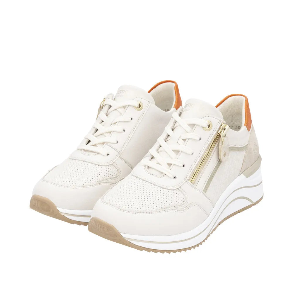 Remonte D0T10-80 women's white wide fit trainers with multi-zip and lace-up design, beige sole, and orange accents.