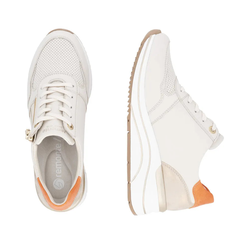 Remonte D0T10-80 women's wide-fit sneakers with multi-zip and lace closure, beige and white colors, and orange accent heel.